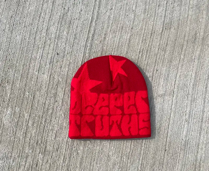 RetailPlug beanie hat in soft knit fabric, shown in a close-up view, featuring a snug fit and classic style.